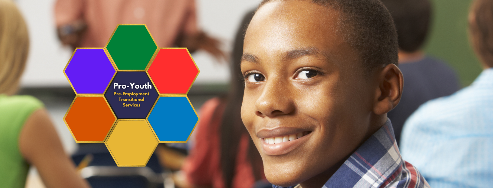 boy smiling in classroom with pro youth logo on side